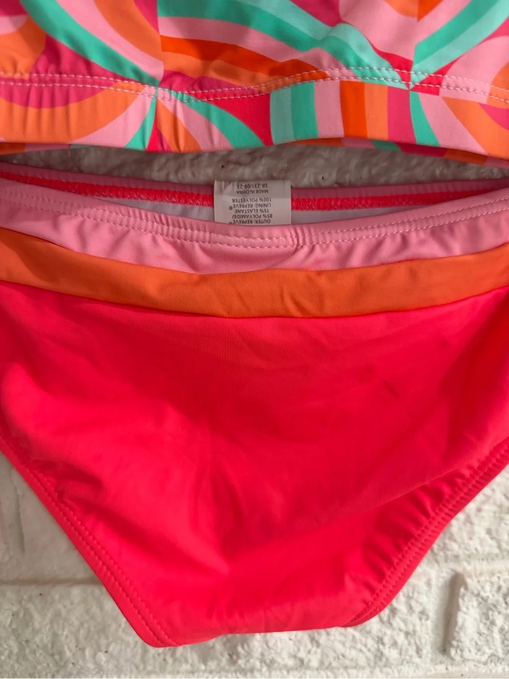 Snapper Rock Girls' Geo Melon Long Sleeve Swim Set in Coral, Turquoise & Pink